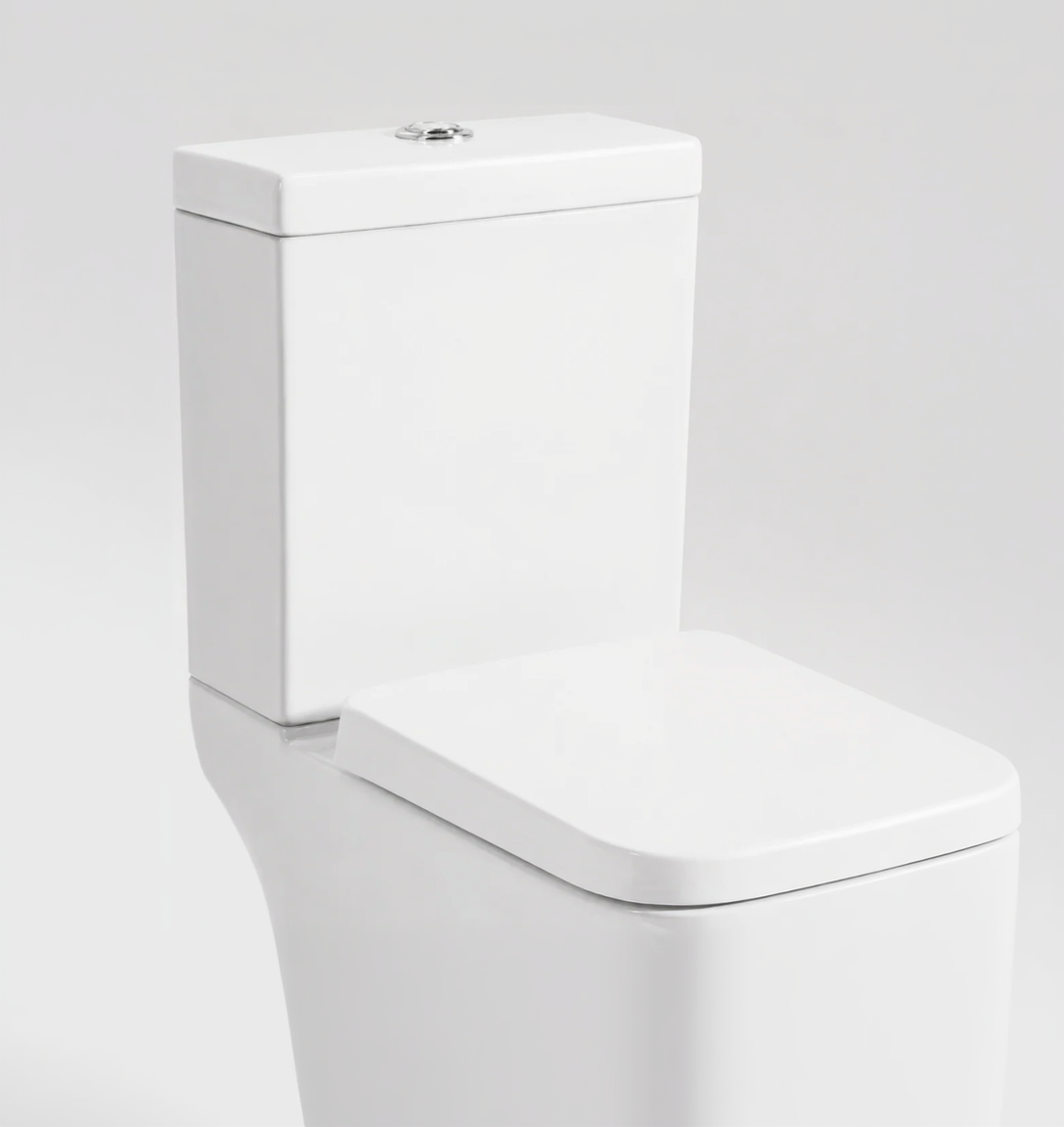 A modern white ceramic toilet with a closed seat lid and a flush button on the tank, shown against a light gray background.