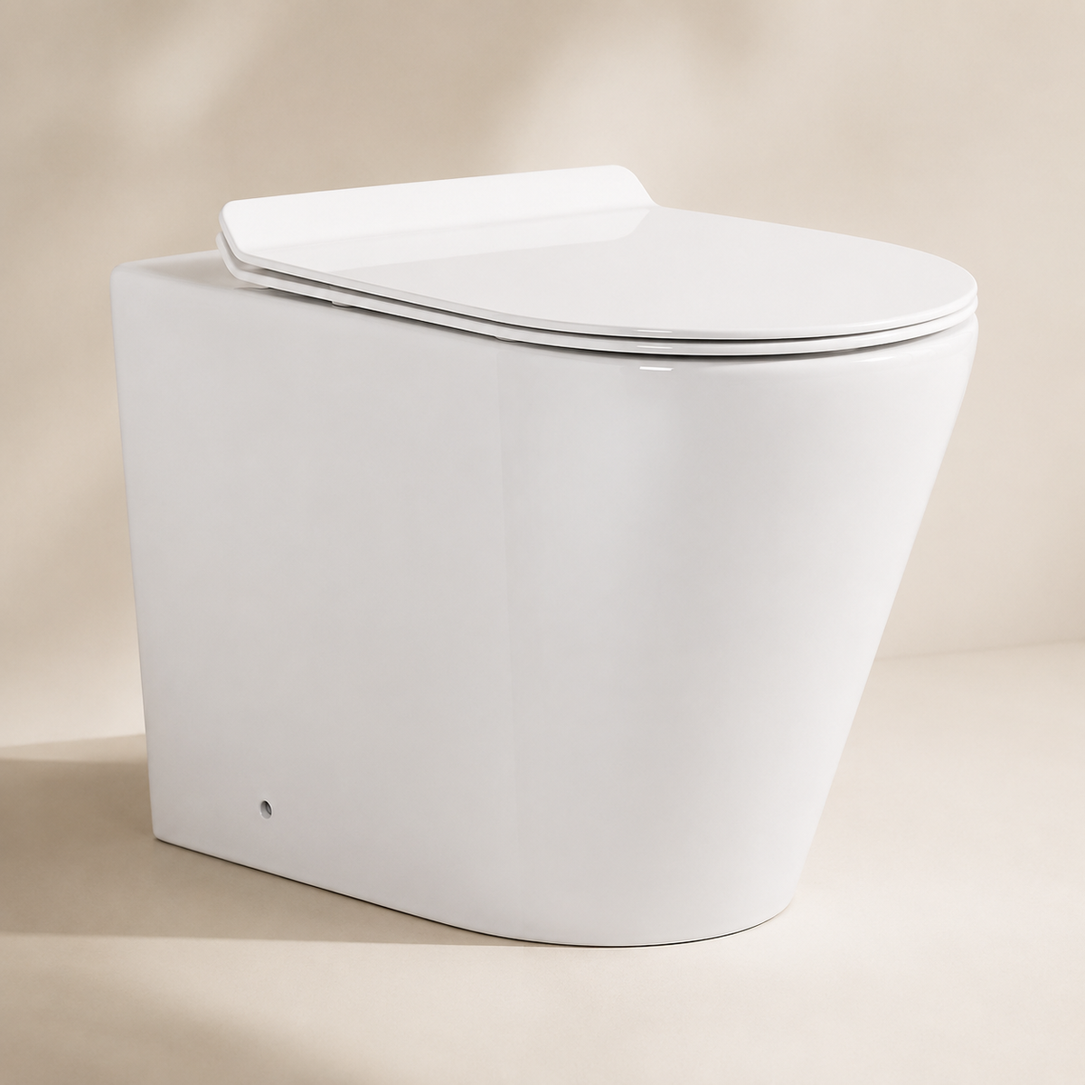 Round Rimless Back-to-Wall Toilet with Soft-Close Seat