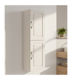 A tall, narrow wall-mounted double cabinet with two paneled doors in a warm off-white finish, featuring silver metal handles, shown against a plain white background.